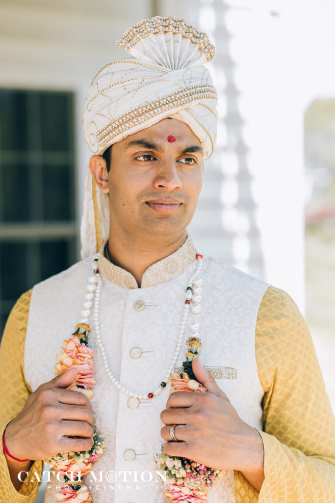Indian backyard wedding groom