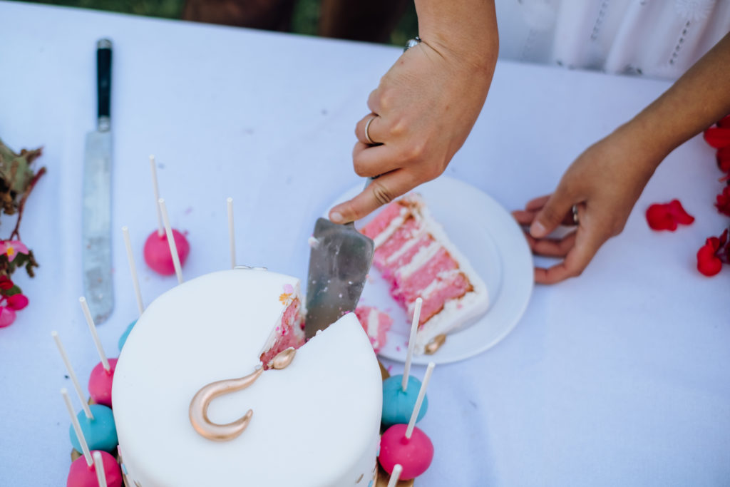 Pink gender reveal cake at Indian gender reveal