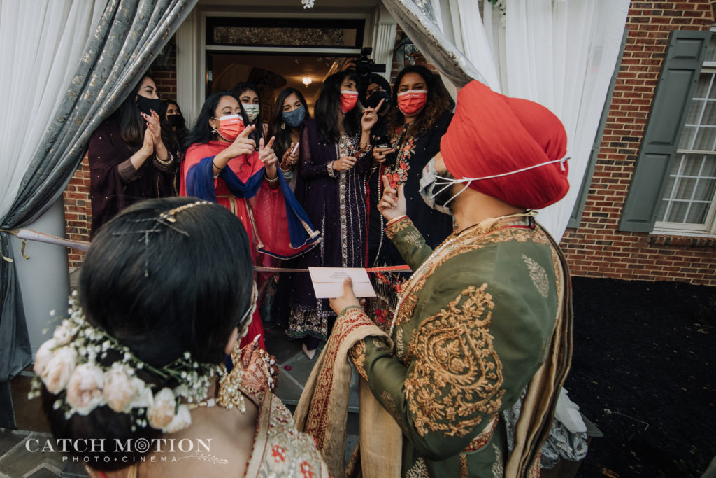 Sikh bride and groom celebrate with family and friends