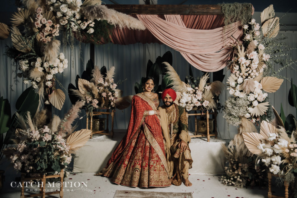 Happy Sikh bride and groom